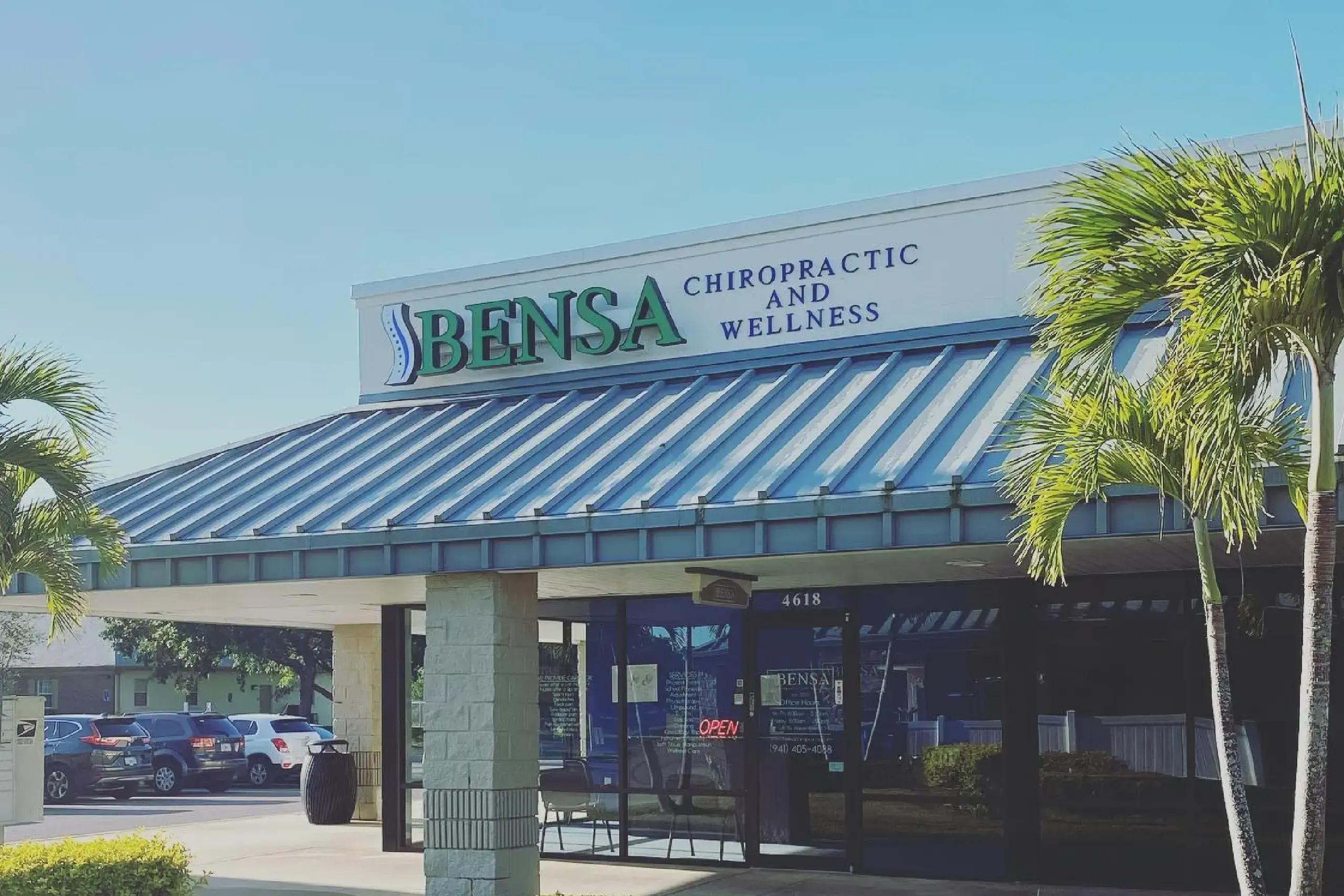 Bensa Chiropractic and Wellness office exterior with signage and palm trees in Bradenton, Florida