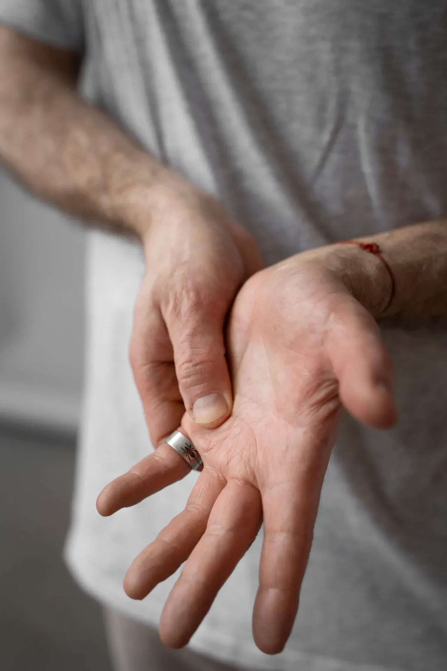 Person concerned about numbness and tingling symptoms at Bensa Chiropractic and Wellness
