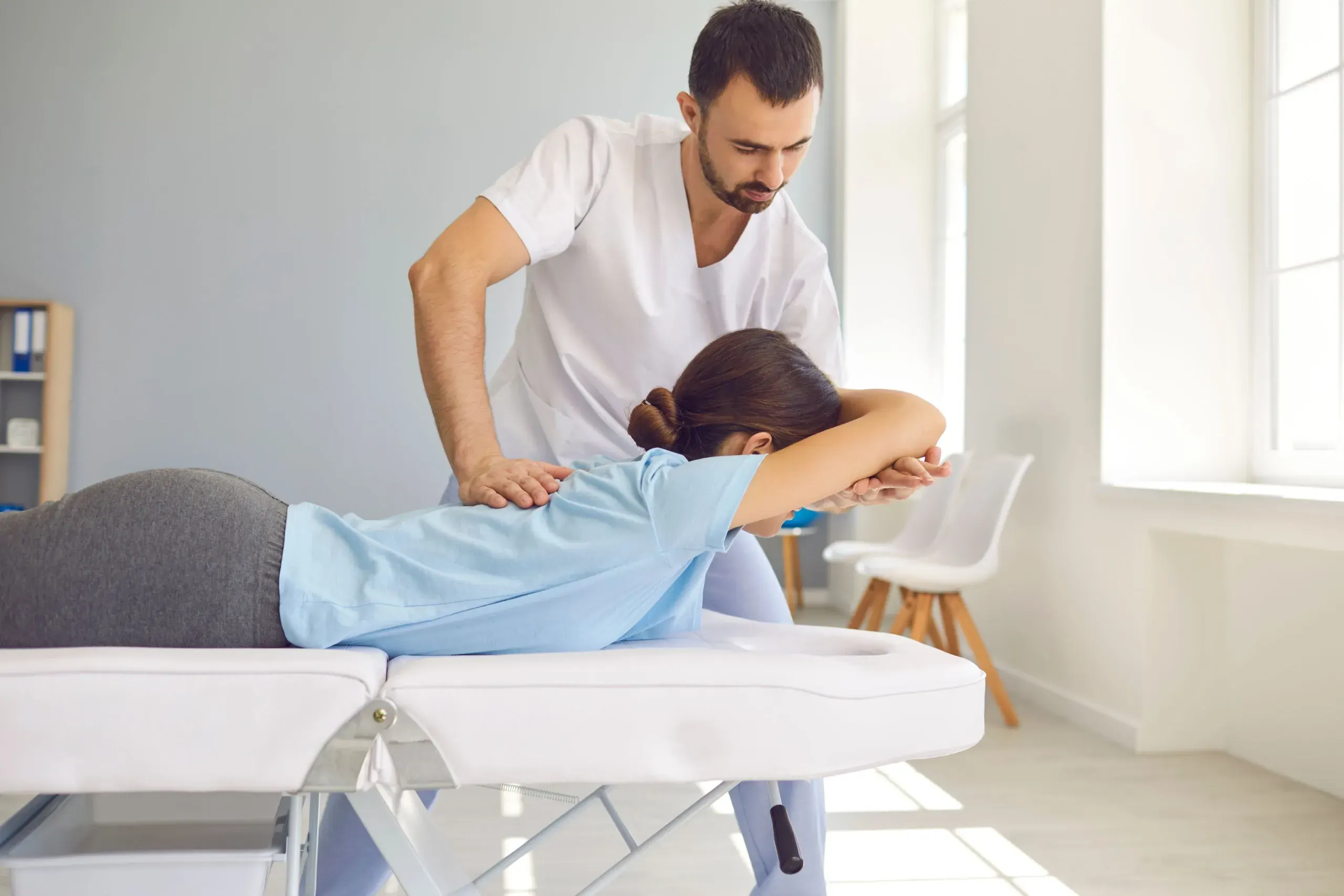 Patient receiving flexion and distraction therapy at Bensa Chiropractic and Wellness in Bradenton FL